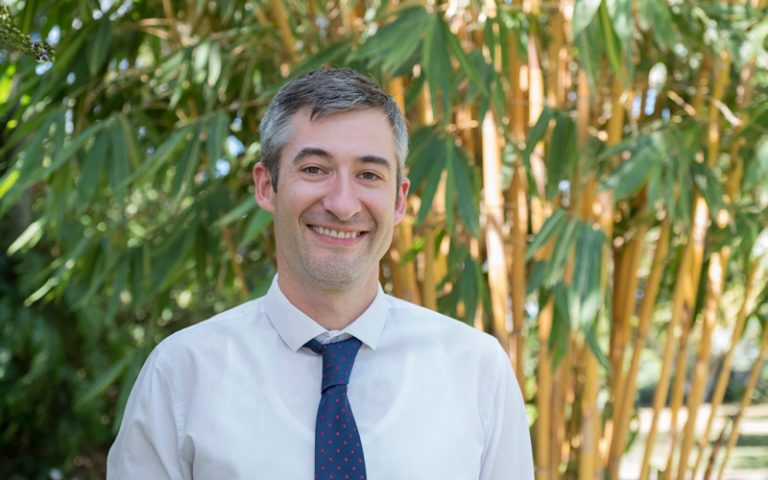 Photo of man in a suit